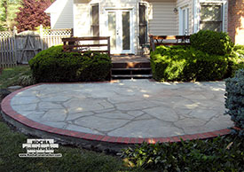 Brick and irregular flagstone patio