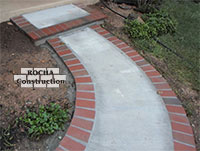 Concrete and brick entrance pour