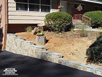 Stone Retaining Driveway Wall Installation