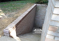 Basement Exit Retaining Wall Repair and Rebuild